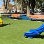 blue slides on artificial grass at sandorf park
