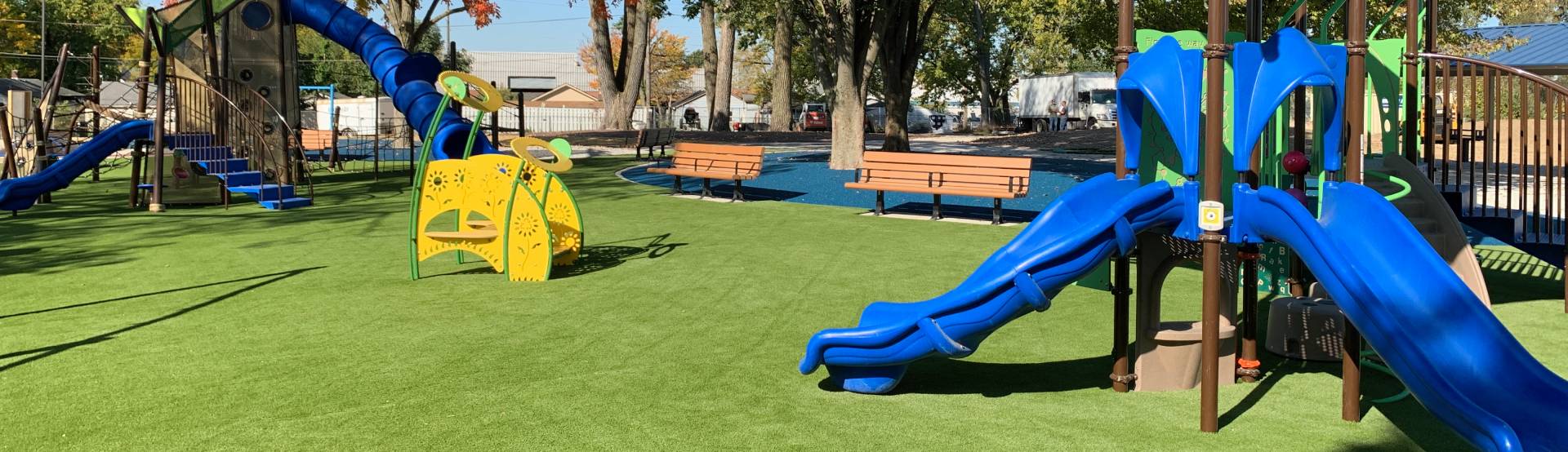 blue slides on artificial grass at sandorf park